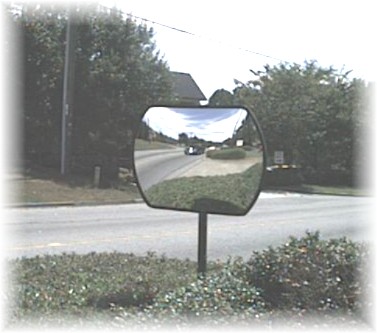 Rectangular mirror mounted outdoors